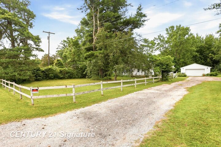 Property Photo:  12097 Swan Creek Road  MI 48609 