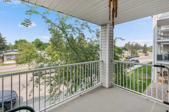 Property Photo:  6224 17 Avenue SE 2210  AB T2A 7X8 