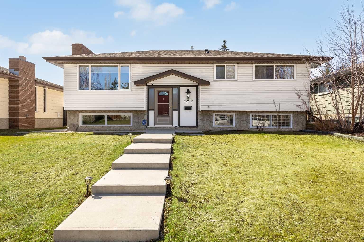 Property Photo:  12212 Canfield Road SW  AB T2W 1J9 