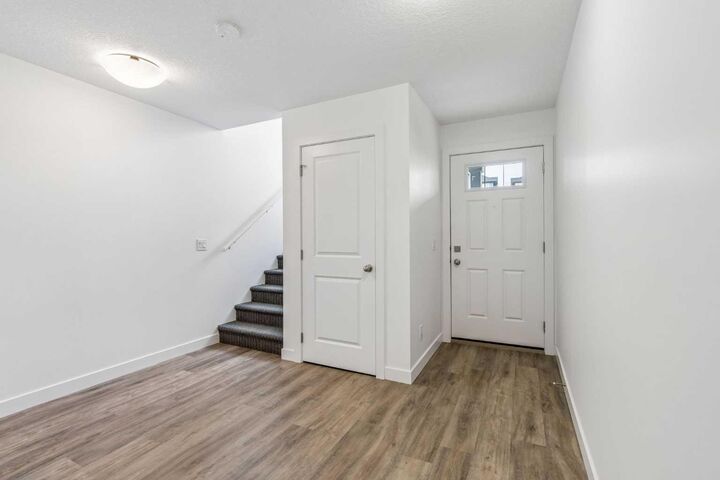 Property Photo: 24 Rivercrest Drive 1002 AB T4C 2C8