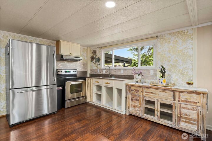 Property Photo:  1921  208th Street E 9  WA 98387 