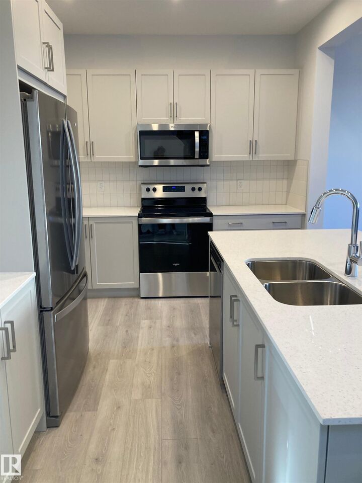 Property Photo:  22904 94 Avenue NW  AB T5T 3Y2 