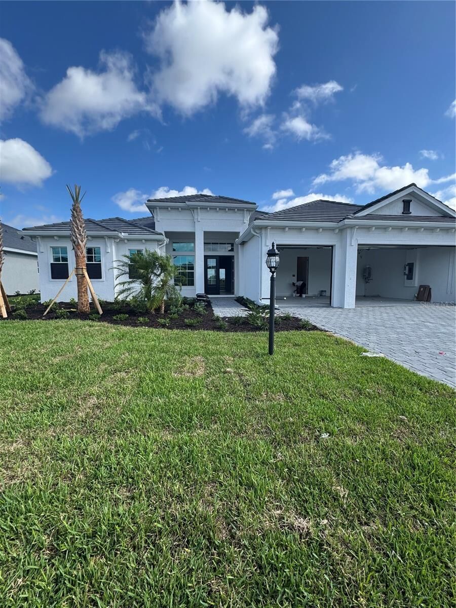 Property Photo: 18838 Cherrystone Way FL 34211