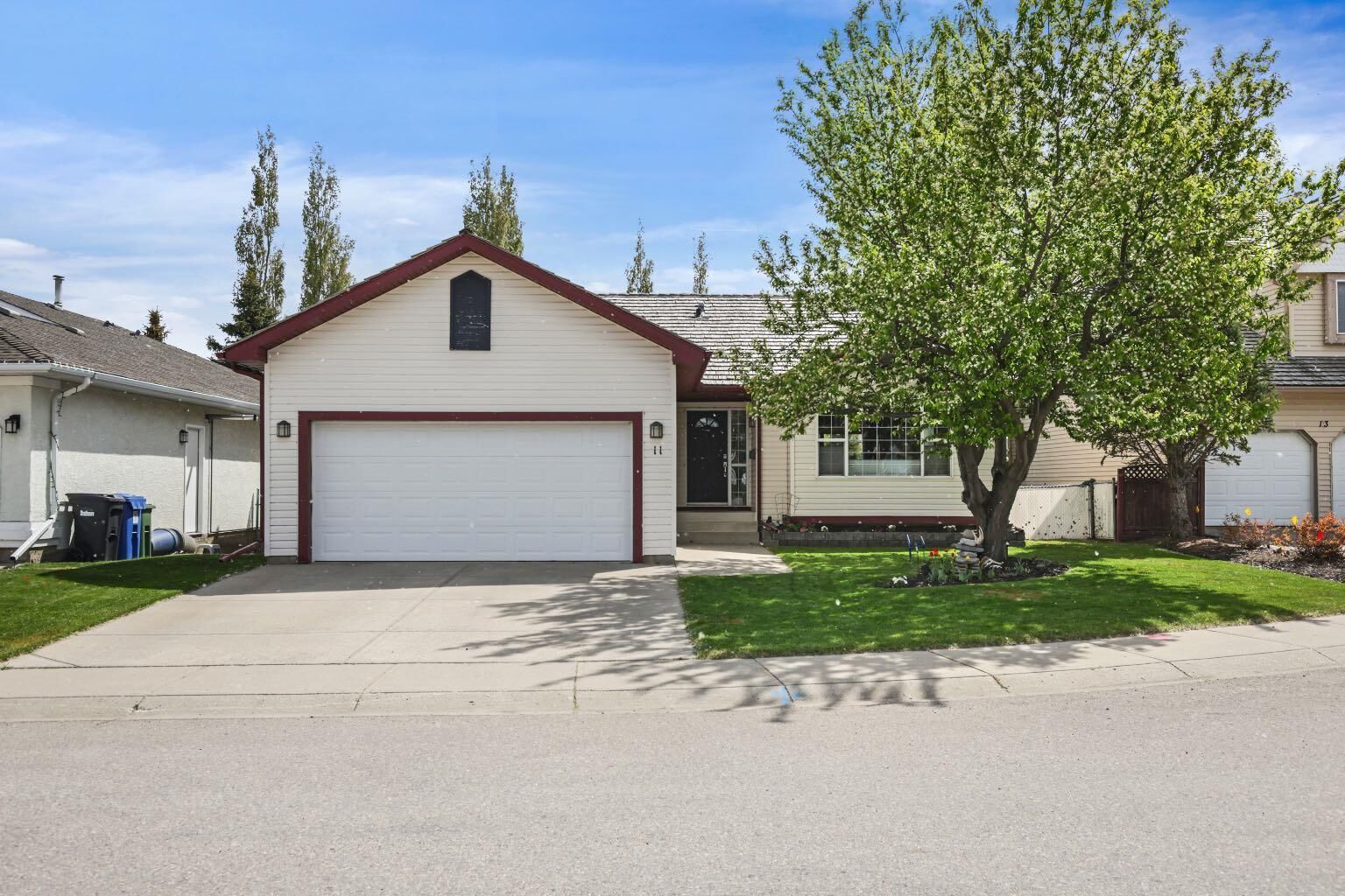 Property Photo: 11 Strathmore Lakes Crescent AB T1P 1L7