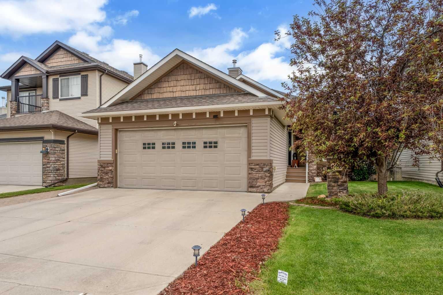 Property Photo:  148 Cimarron Park Circle  AB T1S 2L6 