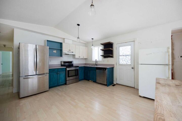Property Photo: 101 Black Bear Crescent AB T9K 2H4