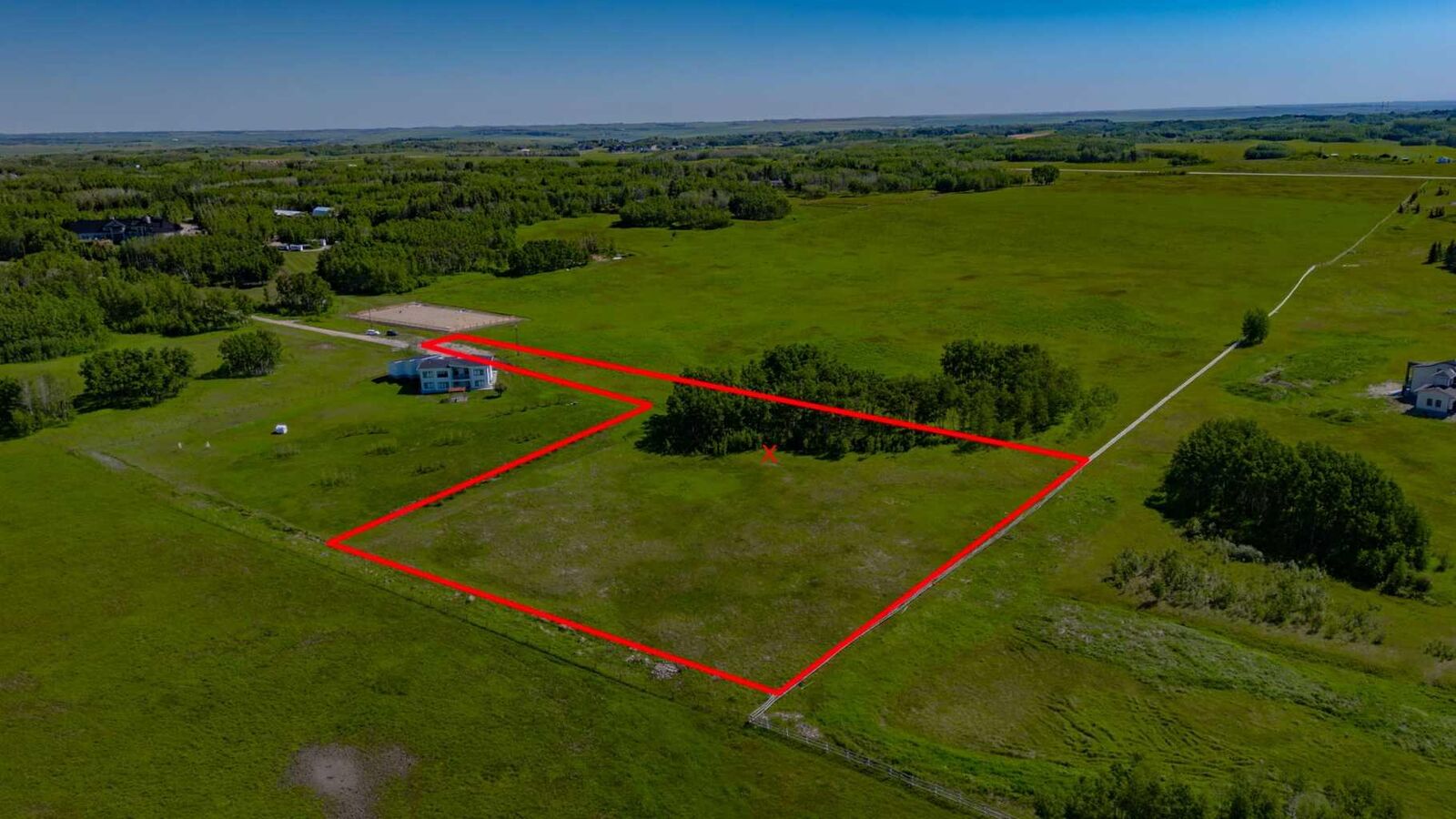 Property Photo: 32103 Badger Road AB T4C 1A2