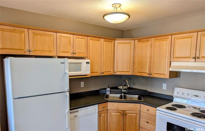 Property Photo: 4144 Buckingham Drive E SK S4V 3A9