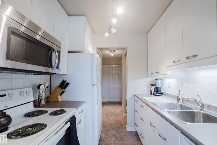 Property Photo: 7211 171 Street NW 202C AB T5T 2R1