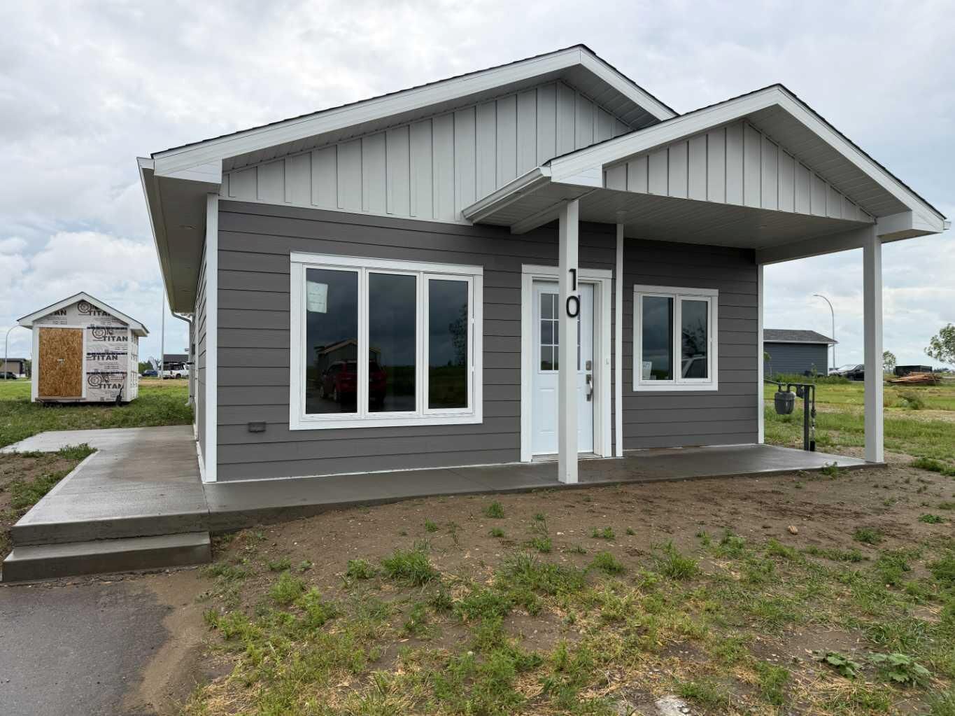 Property Photo: 10 Meadows Way AB T1G 2A2