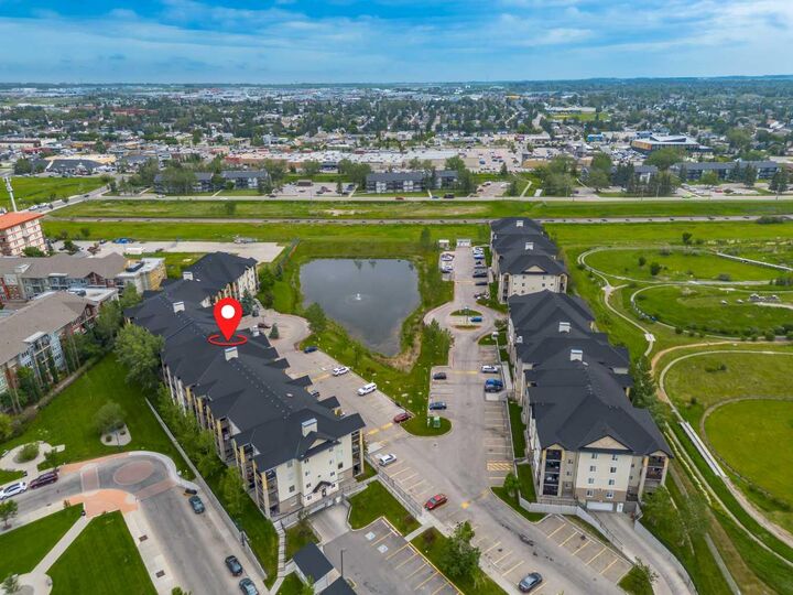 Property Photo:  304 Mackenzie Way SW 8223  AB T4B 3H6 