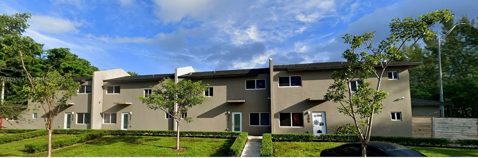 Property Photo: 205 NW 159th St FL 33169