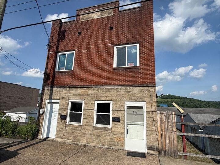 Property Photo:  816-818 McKean  PA 15033 