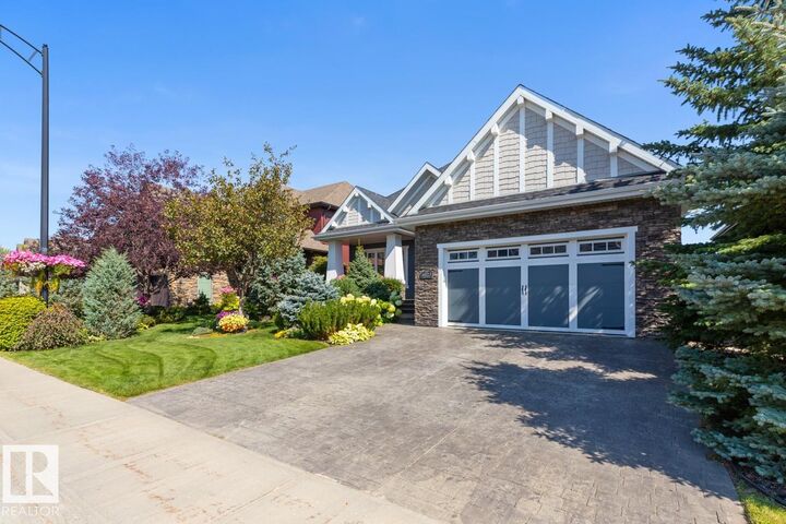 Property Photo: 4023 Whispering River Drive NW AB T6W 0T5