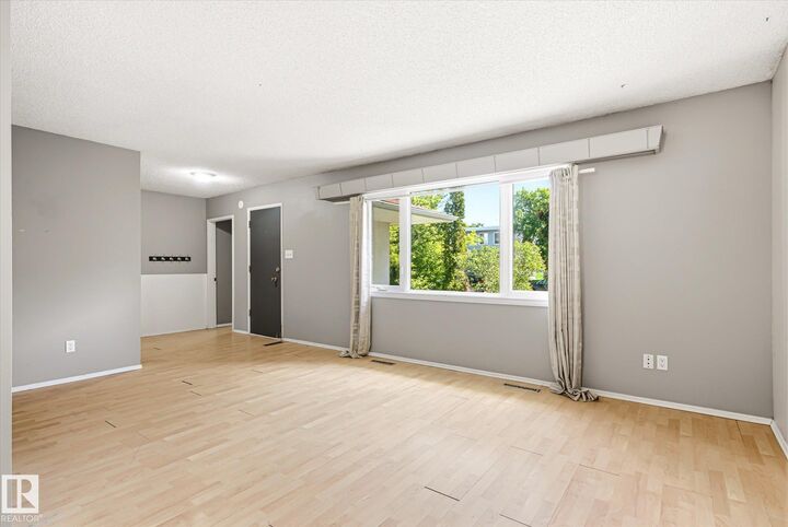 Property Photo: 13104 132 Street NW AB T5L 1R5