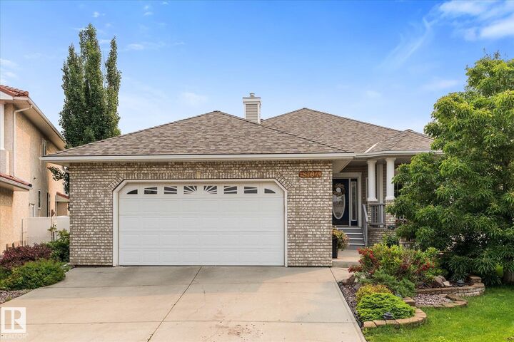 Property Photo:  8704 165 Avenue NW  AB T5Z 3W9 