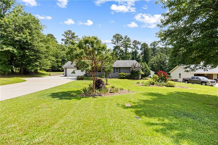 Property Photo:  5671 Raintree Trace  GA 30566 