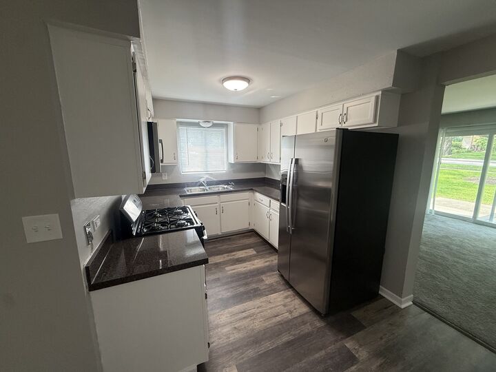 Property Photo: 1121 Chalet Drive 1W IL 60561