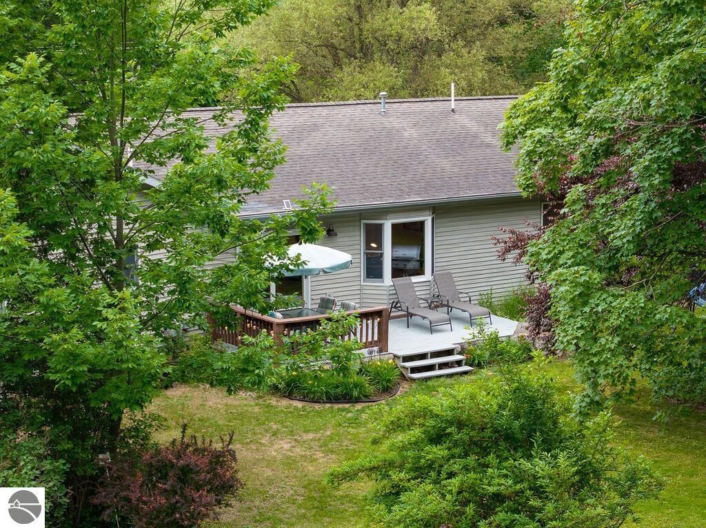 Property Photo:  10313 N Long Lake Road  MI 49685 