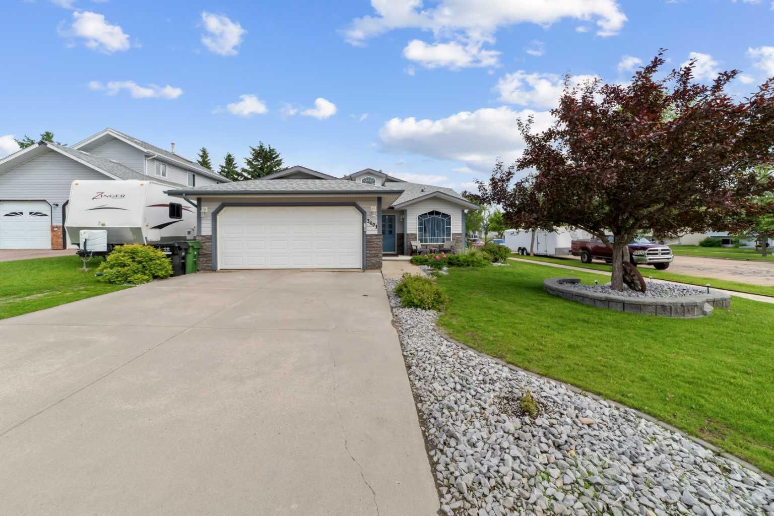 Property Photo:  3401 59 Street Close  AB T4V 4Y9 