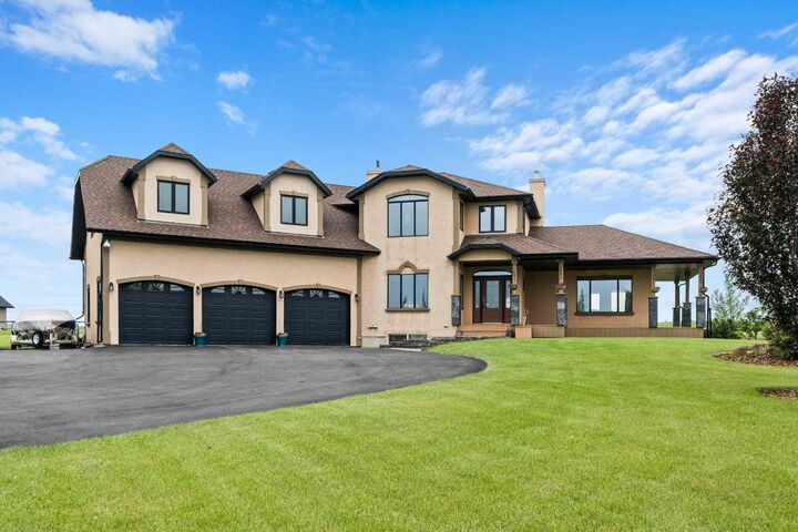 Property Photo: 100 Ravencrest Drive AB T1S 0E8
