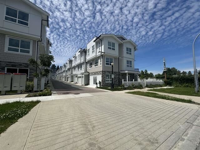 Property Photo: 8181 135A Street 30 BC V3W 3N8