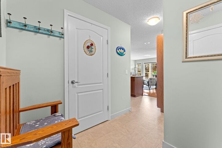 Property Photo: 12650 142 Avenue NW 214 AB T5X 0J4
