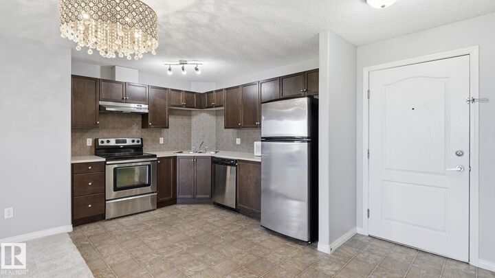 Property Photo: 7327 South Terwillegar Drive NW 7319 AB T6R 0M2