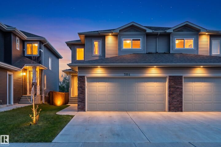 Property Photo: 584 Meadowview Drive AB T8L 0X1