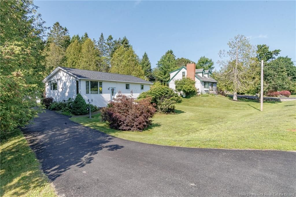 Property Photo:  74 Quispamsis Road  NB E2E 1N7 