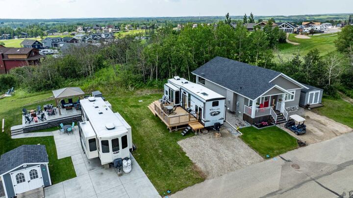 Property Photo:  25054 South Pine Lake Road 6112  AB T0M 1S0 