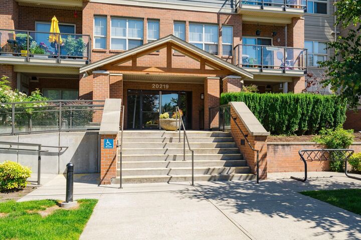 Property Photo: 20219 54A Avenue 109 BC V3A 0C7