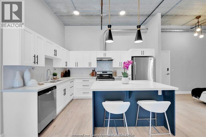 Property Photo:  11941 Tecumseh Road East 404  ON N8N 1L8 