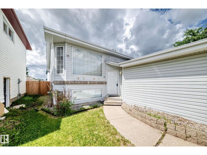 Property Photo:  13124 36 St NW  AB T5A 5C7 
