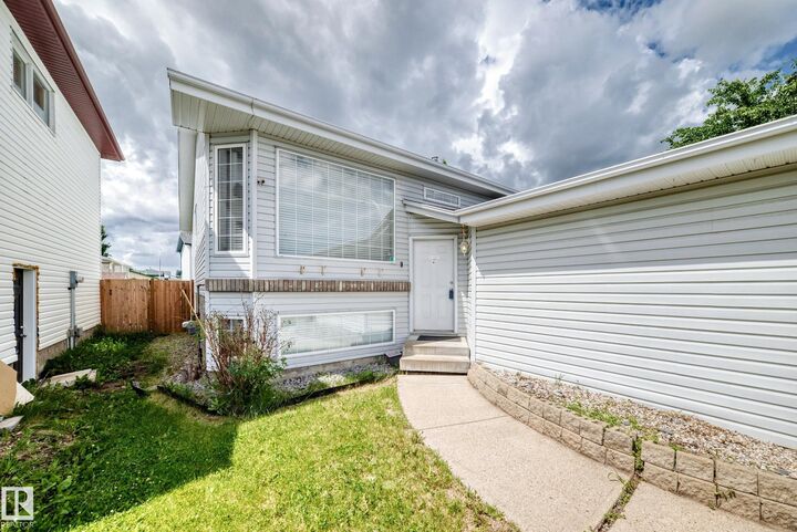 Property Photo:  13124 36 Street NW  AB T5A 5C7 