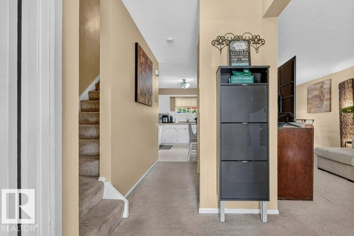 Property Photo:  43 Grandin Village  AB T8N 1R9 