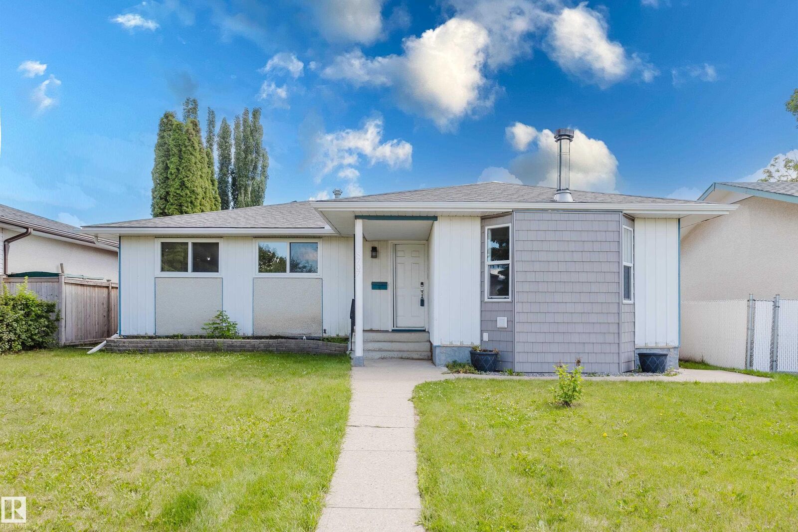 Property Photo:  8707 151 Avenue NW  AB T5E 5Y1 