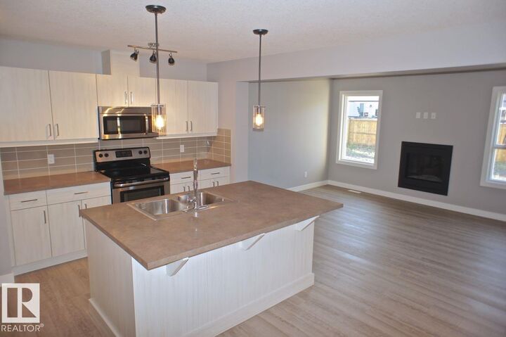 Property Photo: 180 Radcliffe Wynd AB T8L 0S8