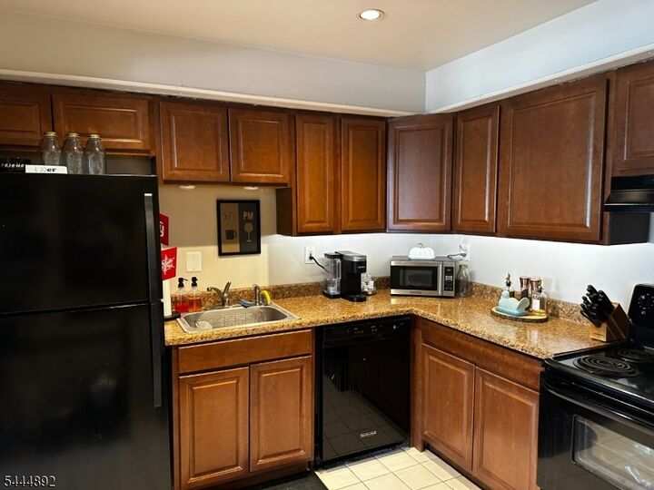 Property Photo:  520 Turnpike C218  NJ 07444 