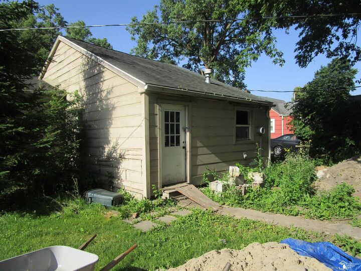 Property Photo:  3450 Swartz Road  MI 48145-9784 