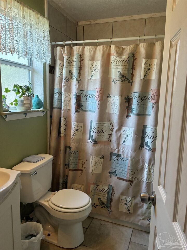 Property Photo: 8253 El Dorado Dr FL 32506