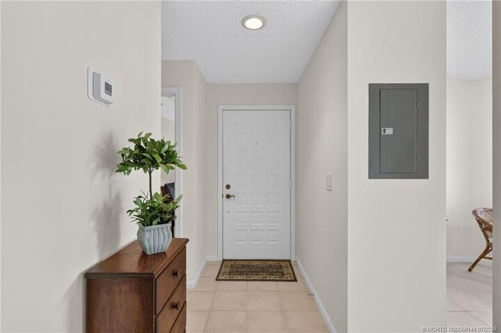 Property Photo:  3470 SE Martinique Trace 201  FL 34997 