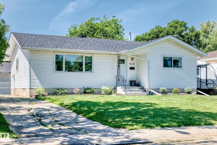 Property Photo:  1028 Mony Penny Crescent  AB T8A 1C3 