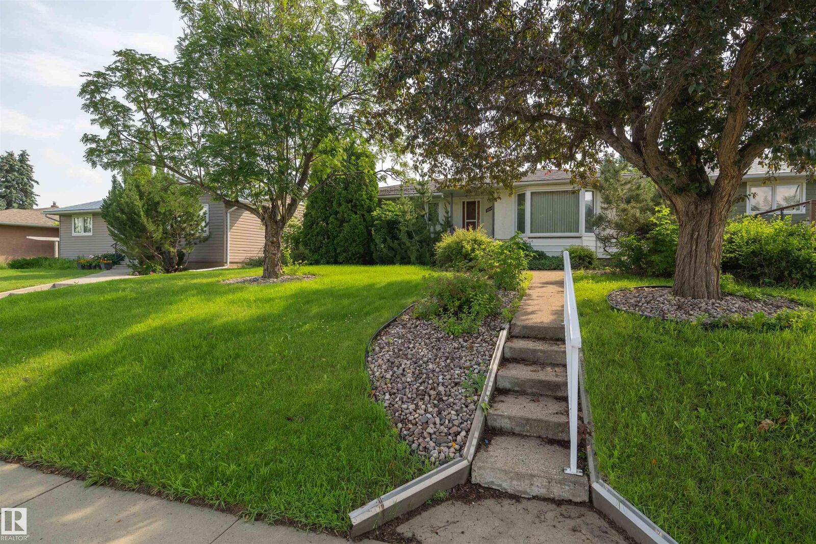 Property Photo: 10627 43 Street NW AB T6H 1V2