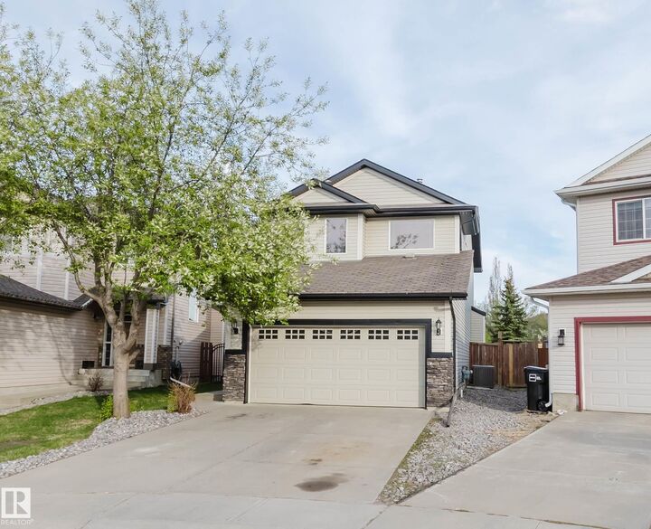 Property Photo: 1227 115 Street SW AB T6W 1W6