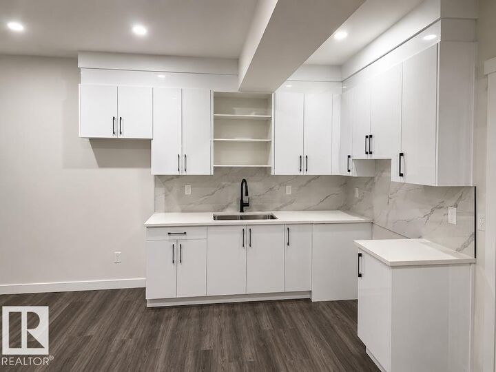 Property Photo: 319 33 Avenue NW Bsmt AB T6T 2S9