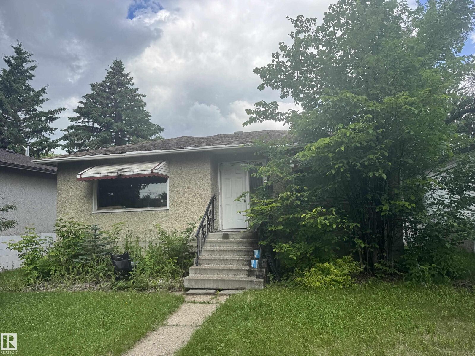 Property Photo:  7748 83 Avenue NW  AB T6C 1A4 
