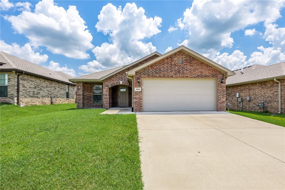 Property Photo:  5904 NW Meade Street  AR 72713 