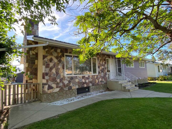 Property Photo:  31 10 Street W  AB T1R 0C1 