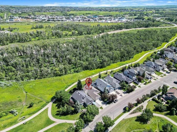 Property Photo:  108 Cimarron Drive  AB T1S 1X3 